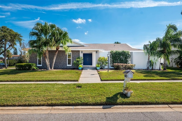 ranch-style house with a front yard