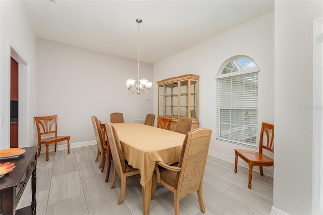 dining room with a chandelier