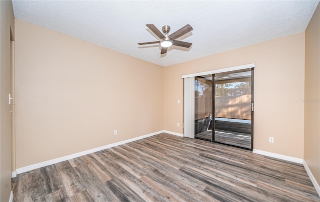 unfurnished room with a textured ceiling, hardwood / wood-style flooring, and ceiling fan