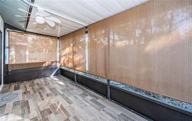 interior space featuring ceiling fan