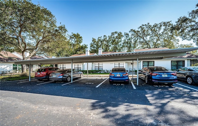 view of parking featuring a carport