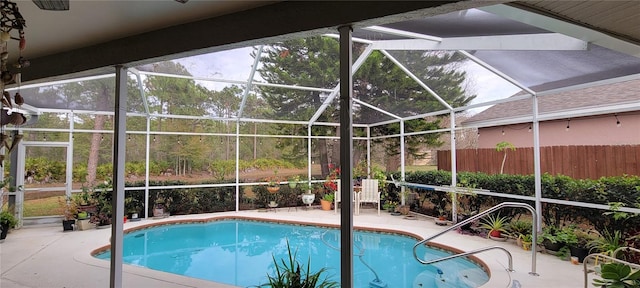 view of pool featuring a lanai and a patio area