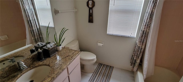 full bathroom featuring vanity, tile patterned flooring, toilet, and shower / tub combo with curtain