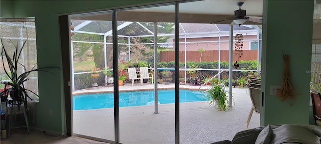 view of pool with ceiling fan