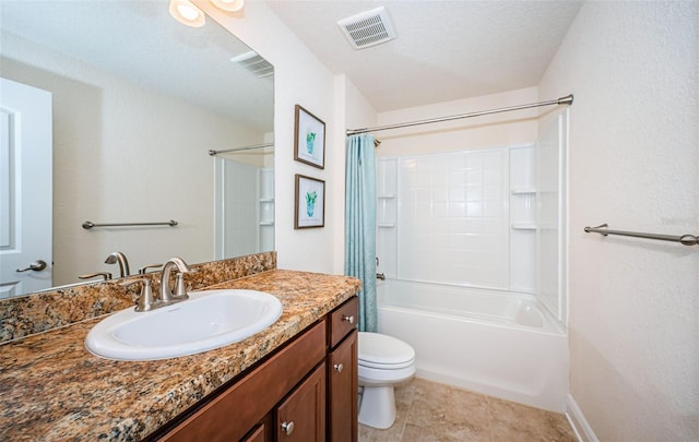 full bathroom with vanity, toilet, a textured ceiling, shower / bathtub combination with curtain, and tile patterned flooring