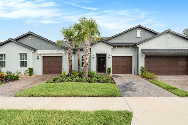 single story home with a garage