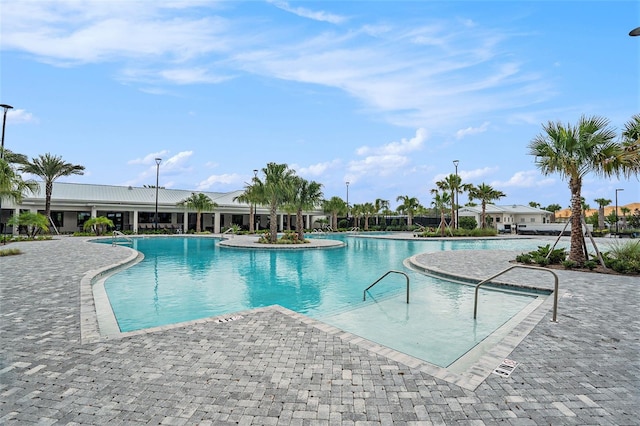 view of pool featuring a patio area