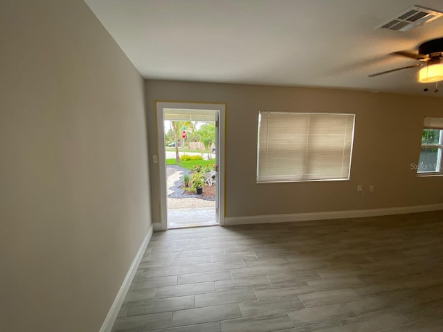 interior space with ceiling fan and light hardwood / wood-style floors