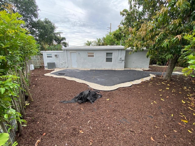 rear view of house with a patio