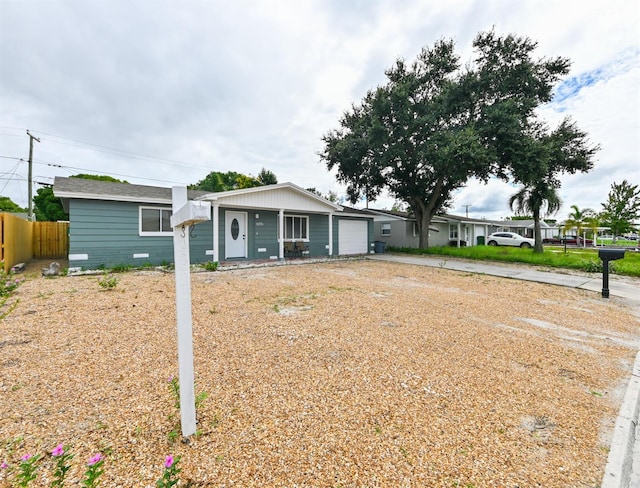 single story home with a garage