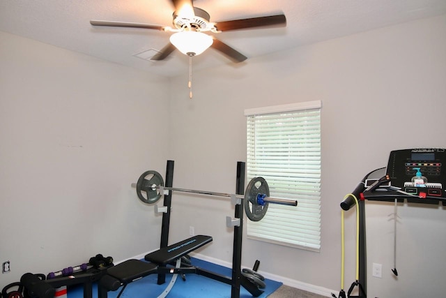 workout area featuring ceiling fan