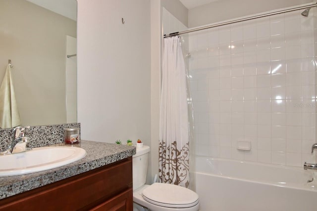 full bathroom with shower / bathtub combination with curtain, vanity, and toilet