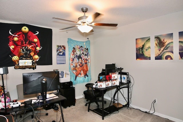 office space with ceiling fan and light colored carpet