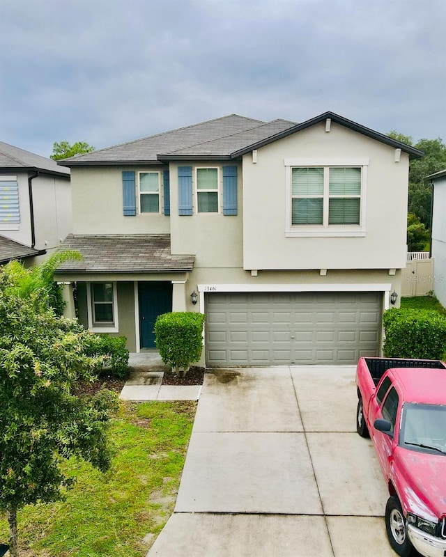 view of front of property featuring a garage