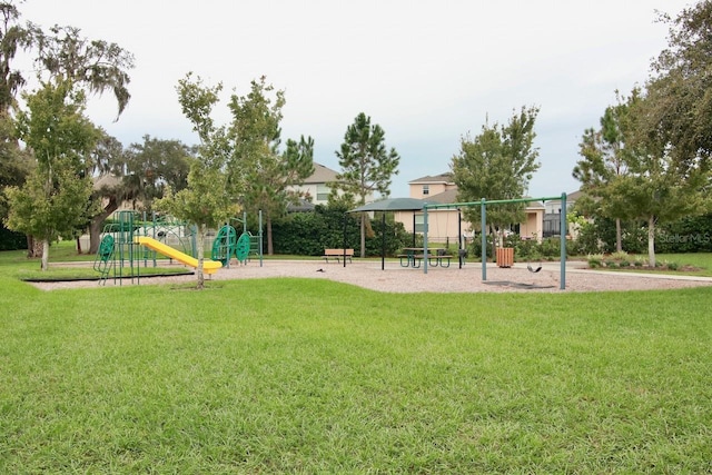 surrounding community with a playground and a lawn