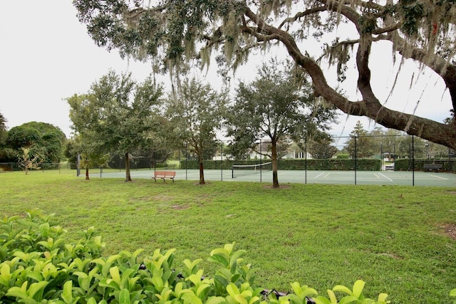 view of yard featuring tennis court