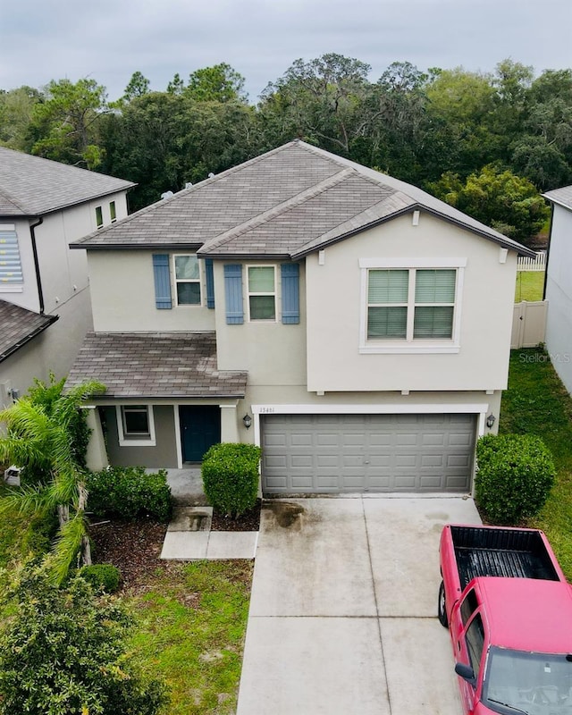 view of front of property with a garage