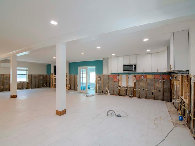 interior space with recessed lighting and plenty of natural light