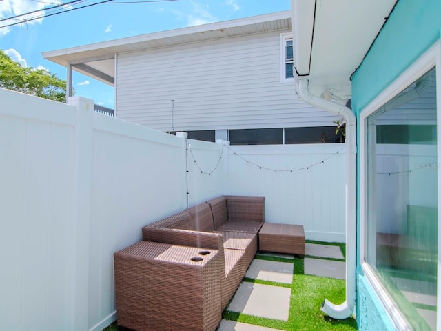 view of patio / terrace with a fenced backyard and outdoor lounge area