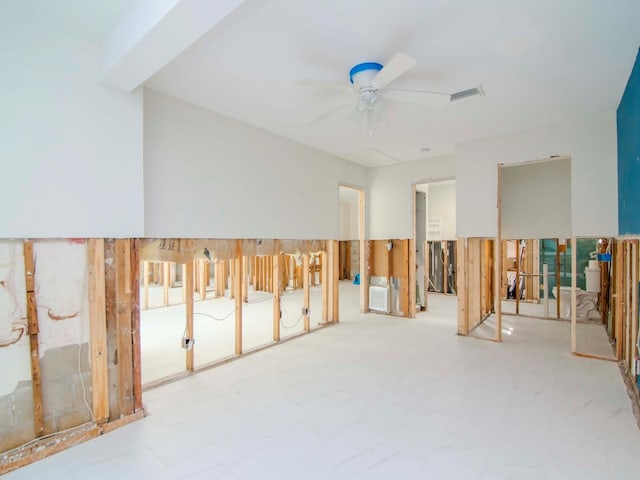 spare room featuring visible vents and ceiling fan