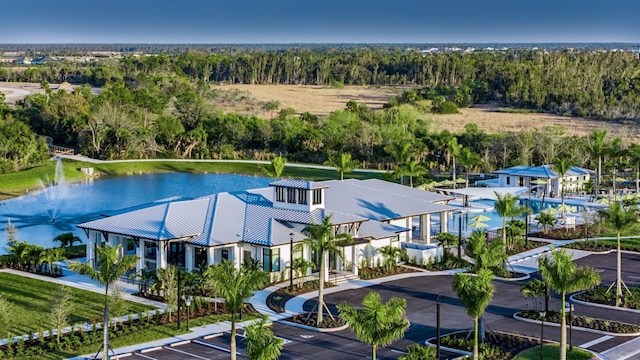 birds eye view of property featuring a water view