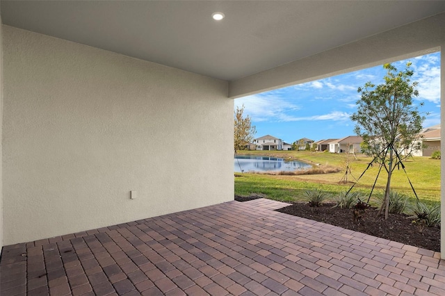 view of patio / terrace with a water view