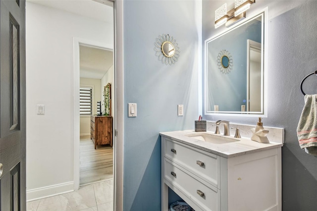 bathroom featuring vanity and tile patterned flooring