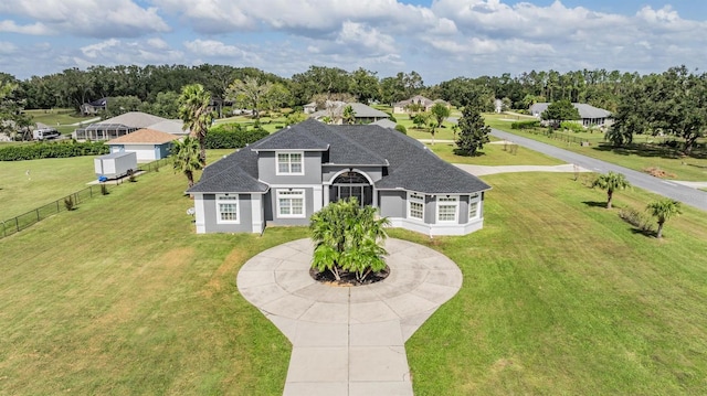 view of front of property with a front lawn