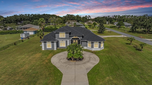 view of front of house featuring a yard