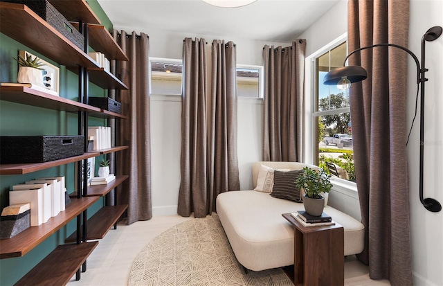 living area featuring light tile patterned floors