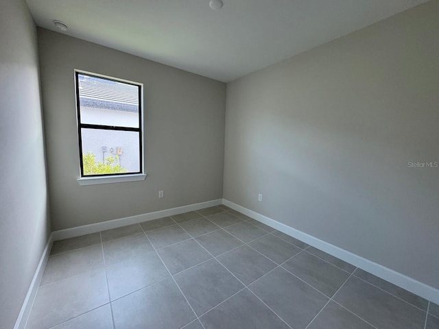 view of tiled spare room