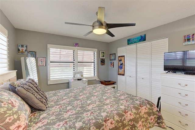 bedroom featuring a closet and ceiling fan