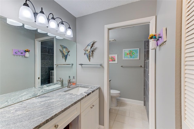 bathroom with toilet, tile patterned flooring, a shower, vanity, and a textured ceiling