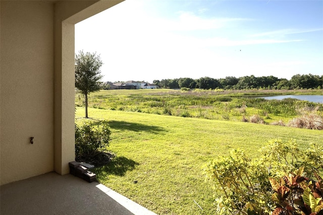 view of yard with a water view