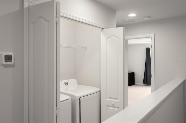 laundry room featuring independent washer and dryer