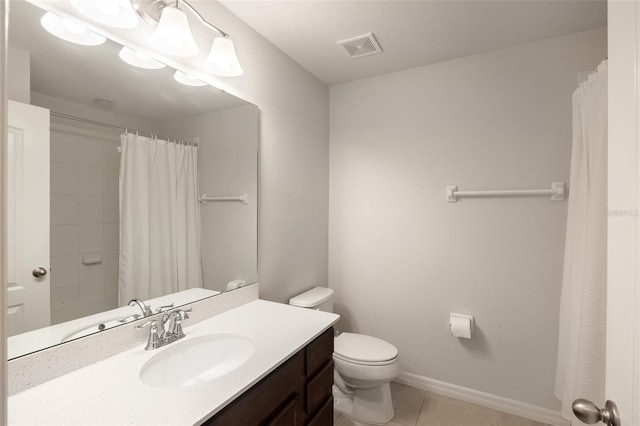 bathroom featuring tile patterned flooring, toilet, a shower with shower curtain, and vanity