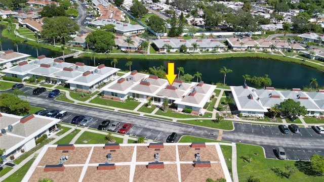 4338 Tahitian Gardens Cir Unit C, Holiday, FL 34691 - aerial overview of property's location with nearby suburban area and a nearby body of water