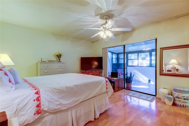 bedroom with access to exterior, light wood-type flooring, and ceiling fan