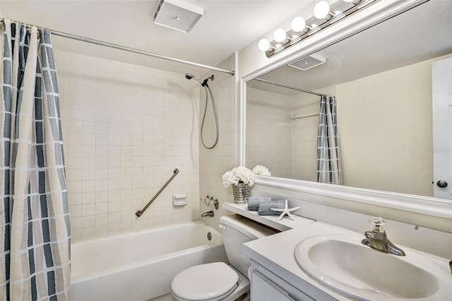 full bathroom with shower / tub combo, vanity, and toilet