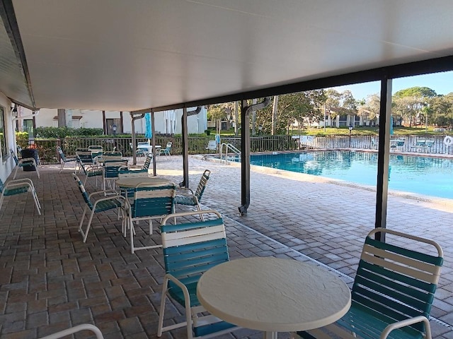 view of patio / terrace featuring a community pool