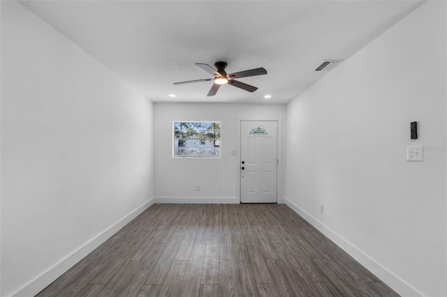 foyer featuring ceiling fan and dark hardwood / wood-style floors