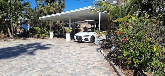 view of parking with a carport