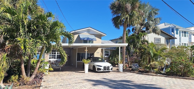 view of front of house with a carport