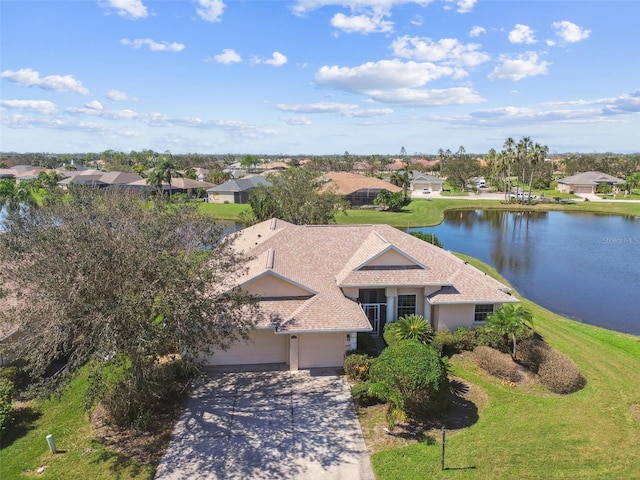 bird's eye view with a water view