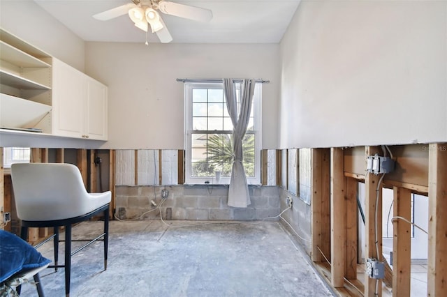 sitting room featuring ceiling fan