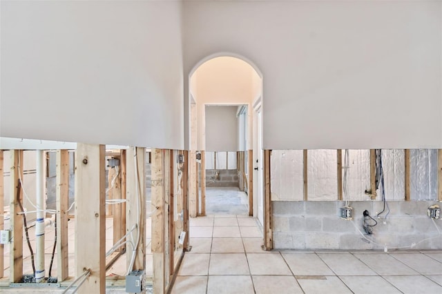 hallway featuring light tile patterned floors