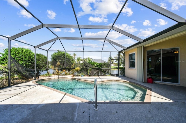 view of pool with a lanai and a patio area