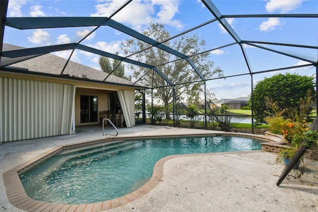 view of pool with a water view, a patio, and a lanai