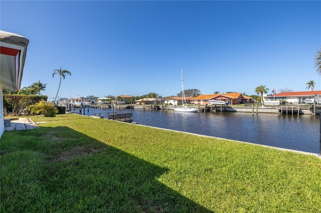 property view of water featuring a boat dock