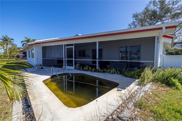 back of house featuring a patio